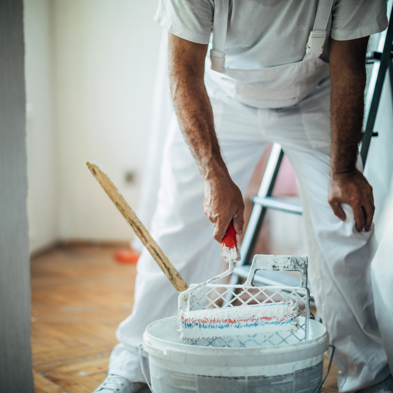 PAINTER MIXING PAINT